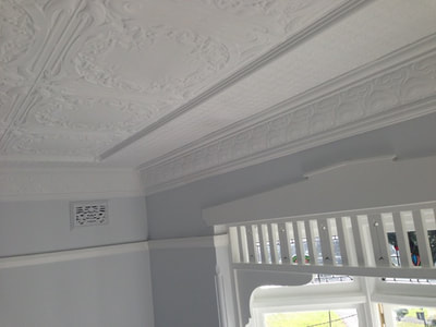 Decorative Federation timber work takes time to properly prepare and paint, but the results are worth it.